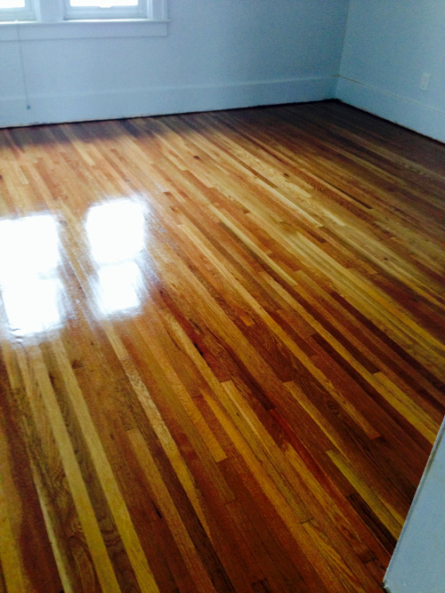 Sanding a hardwood floor after refinishing